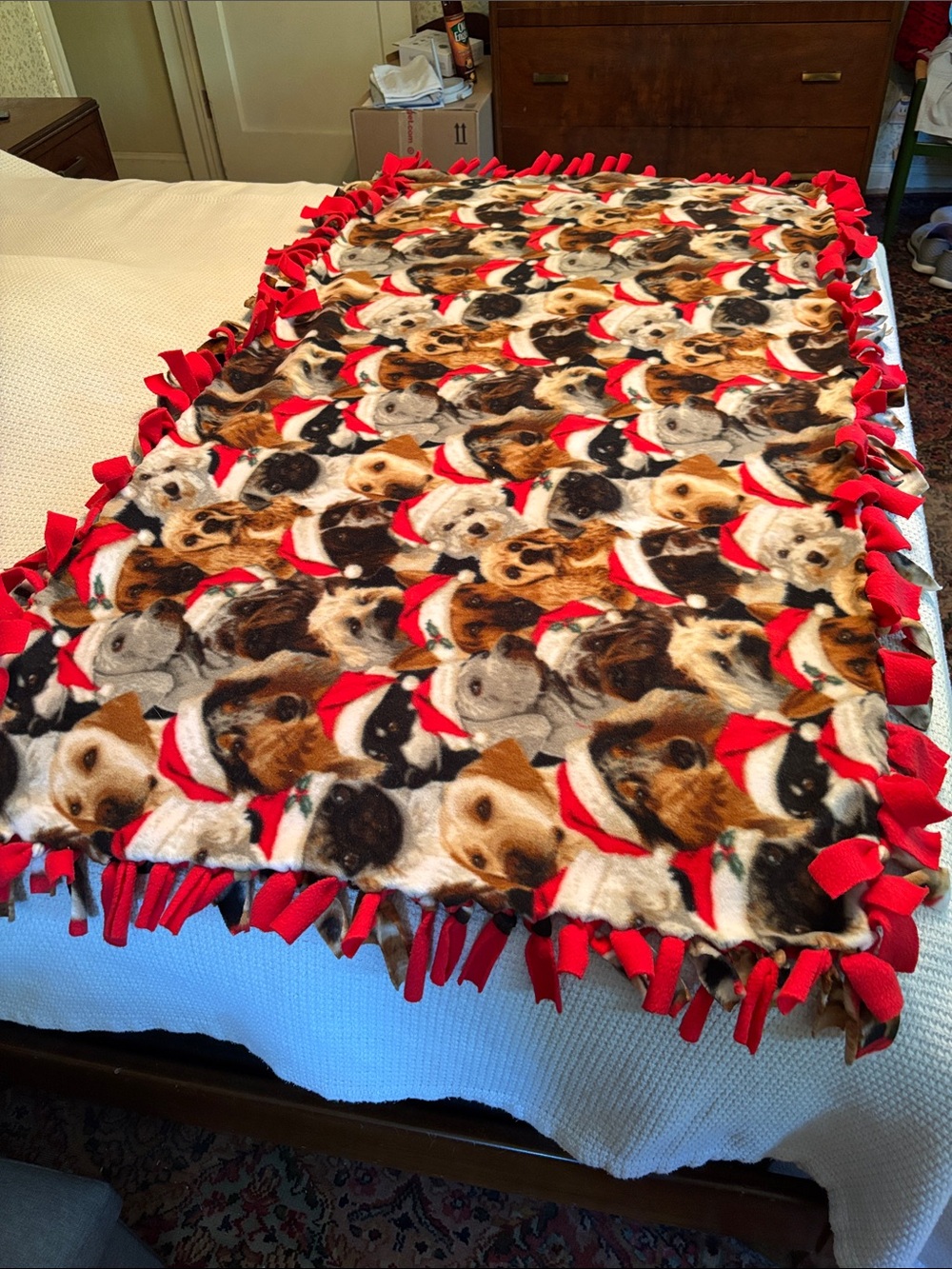 Festive Puppy Print Fleece Tie Blanket with Red Fringe